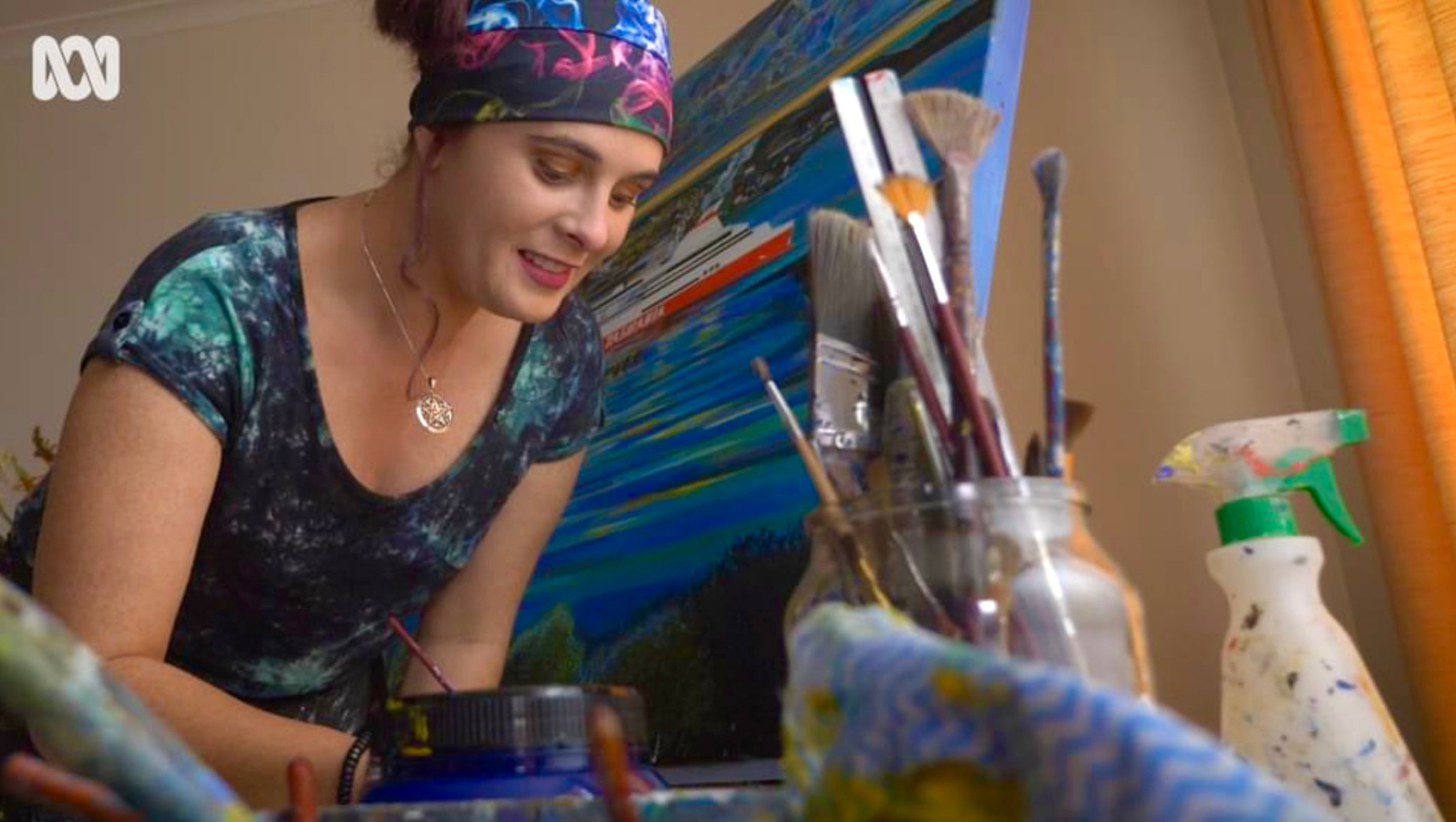 Load video: Painting blind: The visually impaired artist focusing on Tasmanian landscapes | ABC Australia